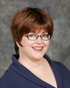 Janice Hurley portrays Alice.