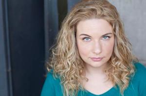 Gina Palmer portrays Sarah in Boys in the Basement.